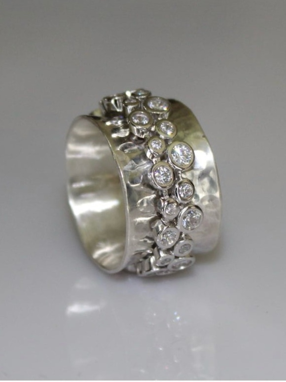 NWOT Artisan Sterling Silver Hammered Band Spinner Ring with Cubic Zirconia